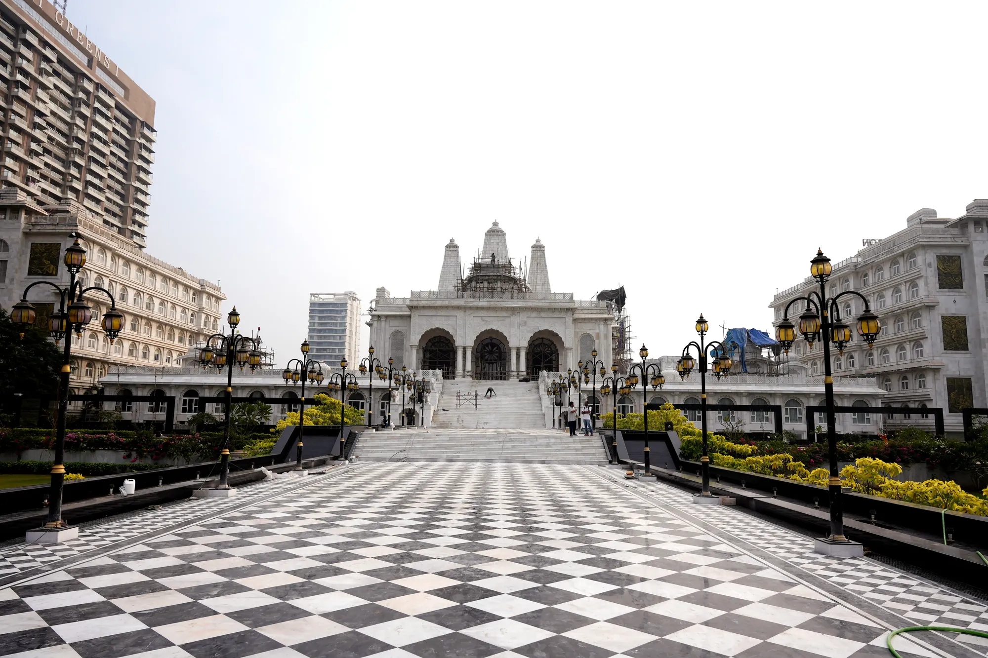 The chequered courtyard leading to the temple